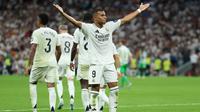 Real Madrid berhasil meraih kemenangan dua gol tanpa balas atas Real Betis pada laga pekan keempat La Liga, Senin (2/9/2024) dini hari WIB. Sepasang gol kemenangan Madrid disarangkan Kylian Mbappe. (AFP/Thomas COEX)
