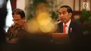 Presiden Jokowi didampingi Menteri ATR/BPN Sofyan Djalil memberikan keterangan pers rencana pemindahan Ibu Kota Negara di Istana Negara, Senin (26/8/2019). Lokasi Ibu Kota berada di wilayah Kabupaten Pejaman Penajam Pasar utara dan Kabupaten Kutai Kartanegara di Kaltim. (Liputan6 com/Angga Yuniar)