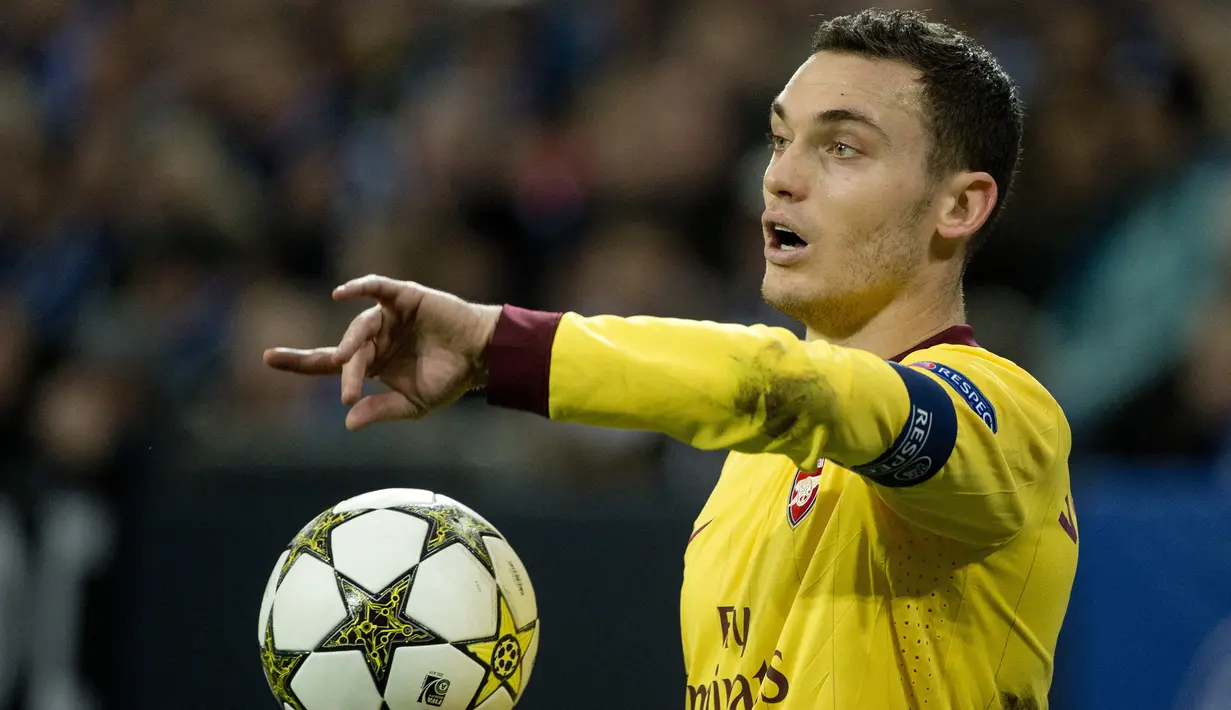 Thomas Vermaelen. Bek tengah Belgia yang didatangkan Arsenal dari Ajax pada awal musim 2009/2010 ini mulai menjabat kapten Arsenal di awal musim 2012/2013 menggantikan Robin van Persie yang hijrah ke MU. Total 5 musim ia tampil 150 laga dengan torehan 15 gol dan 6 assist. (AFP/Odd Andersen)