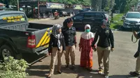 Nenek Jawo (61) saat dibawa ke Polresta Palembang (Liputan6.com / ist - Nefri Inge)