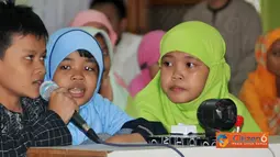 Citizen6, Depok: Sebanyak 80 anak usia SD dan SMP Kls II, mengikuti berbagai jenis lomba yakni lomba mewarnai, Adzan,hafalan surat pendek dan cerdas cermat. (Pengirim: Efrimal Bahri)