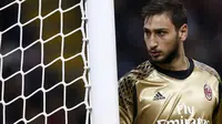 Kiper AC Milan Gianluigi Donnarumma dalam laga melawan Juventus pada 22 Oktober 2016 lalu. (MARCO BERTORELLO / AFP)