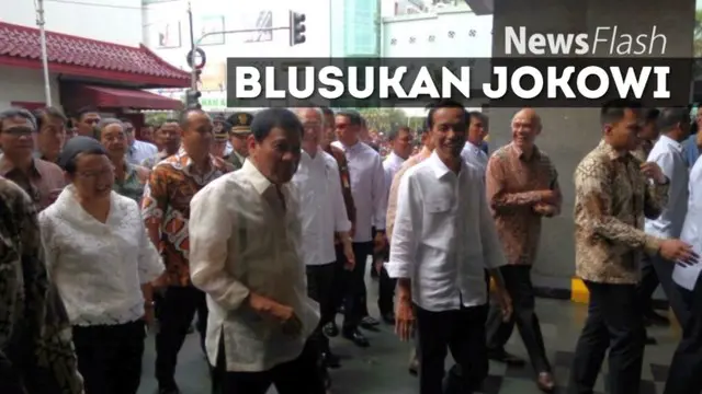 Presiden Jokowi blusukan bersama Presiden Filipina Rodrigo Duterte di Blok A Tanah Abang, Jakarta Pusat. Kedatangan keduanya disambut riuh warga ribuan warga.