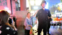 Seorang anggota satuan pengamanan di kota Jinan menarik begitu banyak perhatian.Terungkap, dia pernah menjadi pemain basket terkenal.