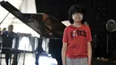 Pianis belia asal Indonesia, Joey Alexander usai latihan piano di Prancis, 10 Agustus 2015. Joey dilahirkan di Bali, 25 Juni 2003, dan sejak tahun lalu menetap di New York untuk mengembangkan bakat dan karirnya di dunia musik.  (AFP PHOTO/PASCAL Pavani)