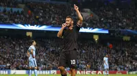 Kapten tim As Roma, Francesco Totti, merayakan golnya ke gawang Manchester City di laga Liga Champions 2014-2015 Grup E di Stadion Etihad, (1/10). (REUTERS/Phil Noble) 