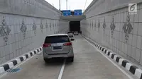 Kendaraan melintasi underpass Matraman di Jakarta, Senin (10/4). Dibuatnya Underpass ini bertujuan mengurai kemacetan dari arah Cikini, Suropati, Menteng, menuju daerah Pramuka dan Matraman hingga Jatinegara. (Liputan6.com/Immanuel Antonius)