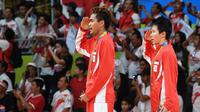 Ganda campuran Indonesia, Tontowi Ahmad/Liliyana Natsir, meraih medali emas pada Olimpaide Rio 2016. (AFP/Goh Chai Hin)