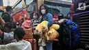 Sebelumnya, pada Rabu (26/3/2025) pemudik yang berangkat dari Terminal Kalideres Jakarta Barat, jumlahnya hampir menembus tiga ribu orang. (Liputan6.com/Angga Yuniar)