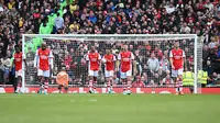Pemain Arsenal tertunduk lesu usai dikalahkan Brighton di Liga Inggris (AFP)