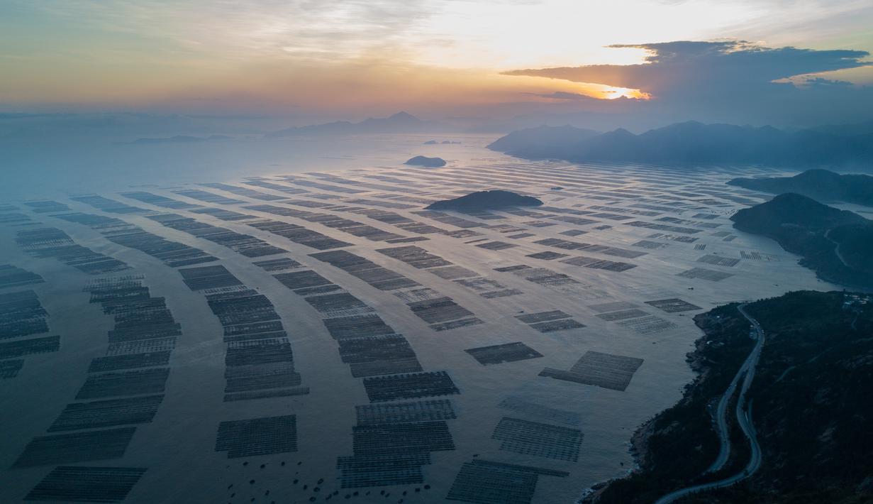FOTO: Pemandangan Indah Matahari Terbenam di Sansha ...