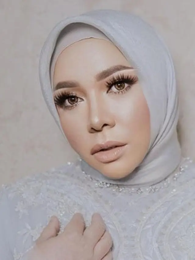 7 Transformasi Melly Goeslaw dari Bobot 100 Kg Hingga Kini 52 Kg, Makin Langsing