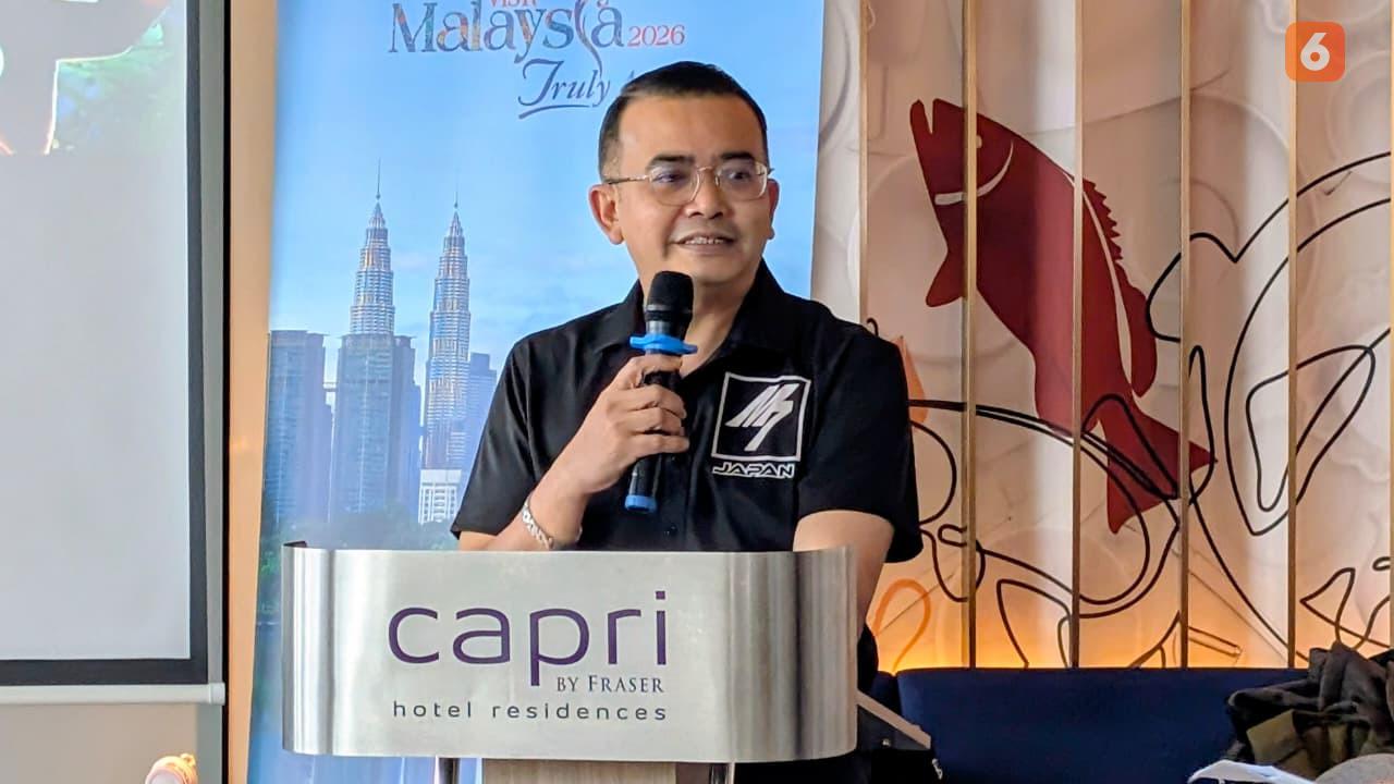 Laporan Liputan6.com dari Malaysia: Rain Rave Water Music Festival di ...