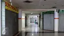 Sejumlah pengusaha di kawasan Glodok, Jakarta Barat, memilih tutup toko terkait dengan demonstrasi besar yang dilakukan ormas Islam, Jumat (4/11). Mereka khawatir menjadi sasaran anarkisme para pendemo tersebut. (Liputan6.com/Gempur M Surya)