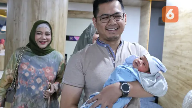 [Fimela] Tommy Kurniawan dan Lisya Nurrahmi