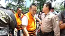 Muhammad Adami Okta saat tiba di tempat pemungutan suara untuk Pilkada 2017 di Gedung KPK untuk menggunakan hak suaranya, Jakarta Rabu (15/2). (Liputan6.com/Helmi Affandi)