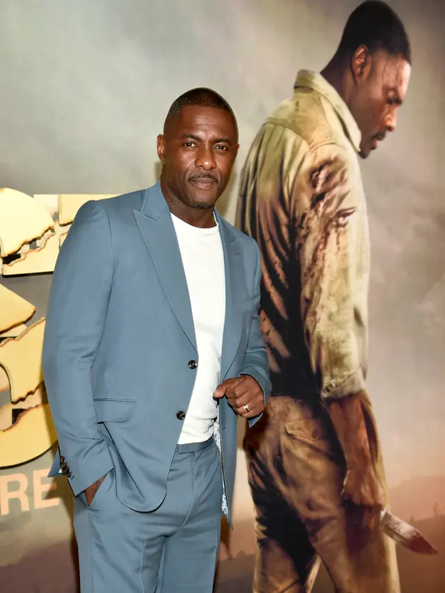Idris Elba Tampil Necis Saat Pimpin Para Bintang di Pemutaran Perdana Film Beast