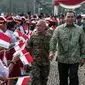 Tommy Soeharto usai mengikuti Apel Gelar Nasional Bela Negara 2016 di Silang Monas, Jakarta, Selasa (23/8). Apel diiikuti 10.000 peserta terdiri dari kementerian/lembaga terkait, TNI, Polri dan komponen bangsa lainnya. (Liputan6.com/Faizal Fanani)