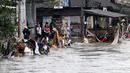 Beberapa wilayah yang terdampak banjir, di antaranya berada di Kabupaten Jembrana, Gianyar, Tabanan, Klungkung dan Kota Denpasar. (SONNY TUMBELAKA/AFP)