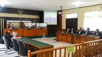 Sidang korupsi mantan Plt Sekda Kuansing di Pengadilan Tipikor Pekanbaru. (Liputan6.com/M Syukur)