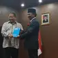 Menteri Komunikasi dan Informatika 2014-2019 Rudiantara dan Menteri Komunikasi dan Informatika 2019-2024 Johnny G. Plate. (Liputan6.com/ Agustinus Mario Damar)