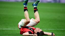 AC Milan mengakhiri kompetisi dengan kekecewaan besar setelah menderita kekalahan tipis 1-2 saat berhadapan dengan Cagliari. (AFP/Piero Cruciatti)