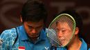Komunikasi antara Tontowi dan Liliyana untuk selalu menjaga fokus pada pertandingan. (Bola.com/Arief Bagus)
