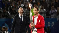Upacara Pembukaan Olimpiade Paris 2024 berlangsung meriah di Sungai Seine, Prancis, pada Sabtu (27/7/2024) dini hari WIB. (AFP/Jeff Pachoud)