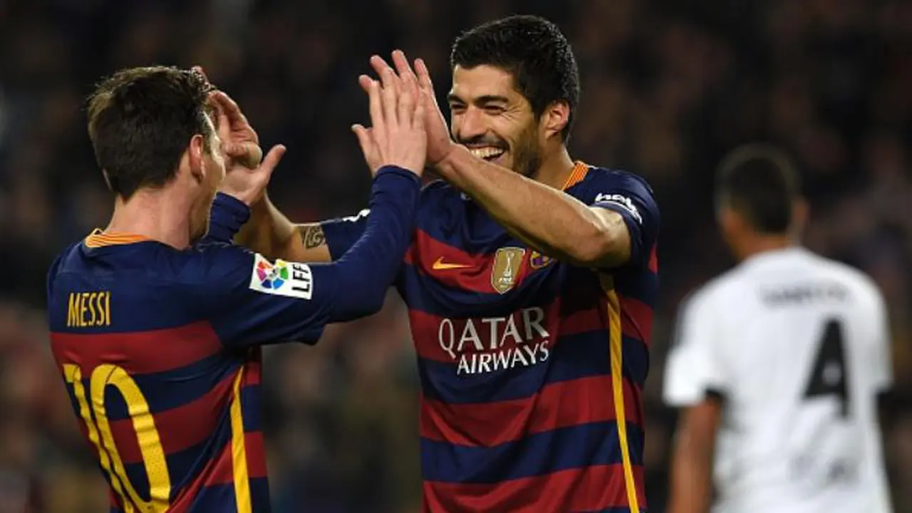 Lionel Messi dan Luis Suarez