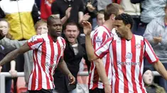 Sunderland's Djibril Cisse celebrates scoring against Hull City during an English FA Premier League match at Stadium of Light, England, on April 18, 2009. AFP PHOTO/GRAHAM STUART