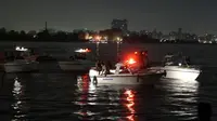 Tim penyelamat tengah mencari korban hilang dari tabrakan kapal kargo dan penumpang di Sungai Nil, Mesir. (BBC)