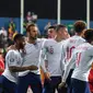 Perayaan gol timnas Inggris pada laga kedua Kualifikasi Piala Eropa 2020 yang berlangsung di Stadion Pod Goricom, Podgrica, Selasa (26/3). Timnas Inggris menang 5-1 atas Montenegro. (AFP/Andrej Isakovic)