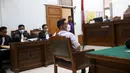 Terdakwa obstruction of justice atau upaya menghalangi penyidikan perkara tewasnya Brigadir Nofriansyah Yosua Hutabarat atau Brigadir J, Kompol Chuck Putranto menjalani sidang tuntutan di Pengadilan Negeri Jakarta Selatan, Jumat (27/1/2023). Sebelumnya, jaksa penuntut umum (JPU) juga telah menuntut Arif Rahman Arifin satu tahun penjara atas kasus yang sama. (Liputan6.com/Johan Tallo)