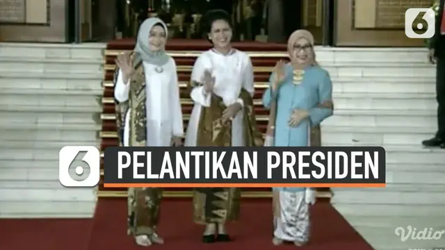 Ibu Negara Iriana Jokowi berjalan bersama dengan Mufidah Jusuf Kalla dan Wury Ma'ruf Amin ke dalam sidang paripurna untuk menyaksikan Pelantikan Presiden dan Wakil Presiden periode 2019-2024.