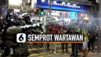 Ketegangan meningkat antara polisi dan wartawan di Hong Kong. Saat protes pro-demokrasi yang terjadi di Causeway Bay, polisi mendorong mundur para wartawan dengan cara menyemprotkan cairan lada.