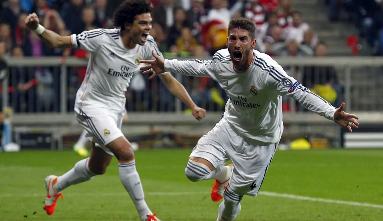 Selebrasi Sergio Ramos (kanan) usai mencetak gol di laga kedua kedua semifinal Liga Champions di Allianz Arena, Munich (30/4/2014). (REUTERS/Michaela Rehle)