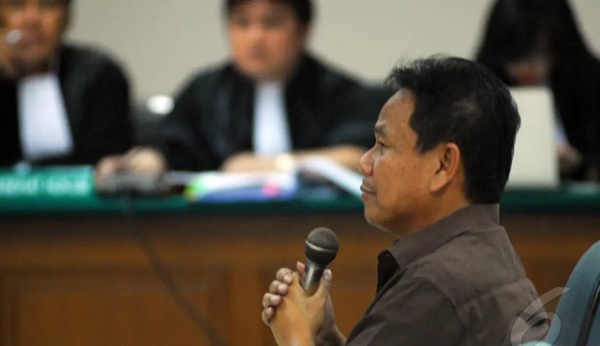 Sesmenpora Wafid Muharram hadir sebagai saksi di Pengadilan Tipikor Jakarta, Senin (5/5/2014) (Liputan6.com/Miftahul Hayat).