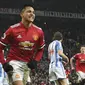 Alexis Sanchez menyumbang satu gol saat Manchester United (MU) mengalahkan Huddersfield Town pada pekan ke-26 Liga Inggris di Old Trafford, Sabtu (3/2/2018). MU menang 2-0. (PAUL ELLIS / AFP)