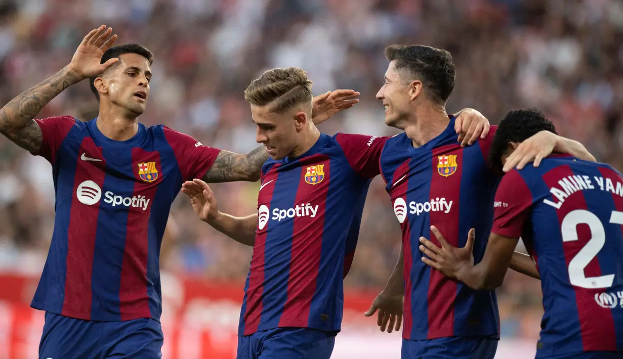 Keunggulan 2-1 untuk Barcelona bertahan hingga laga usai. (JORGE GUERRERO/AFP)
