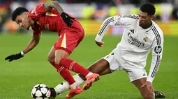 Liverpool tampil menekan sejak menit awal pertandingan, sementara Real Madrid bermain lebih tenang. (Oli SCARFF/AFP)