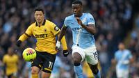 Pertandingan antara Manchester City antara Wolves di Liga Inggris. Marc Guehi (kanan) melakukan debut sebagai starter. (Darren Staples / AFP)