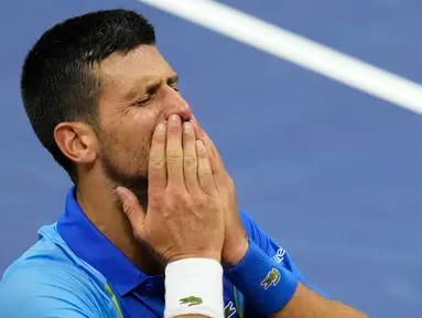 Ekspresi petenis Serbia Novak Djokovic usai mengalahkan petenis Rusia Daniil Medvedev pada final tunggal putra kejuaraan tenis US Open 2023 di New York, Amerika Serikat, Minggu (10/9/2023). (AP Photo/Mary Altaffer)