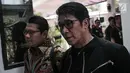 Komedian Parto Patrio mengunjungi pelawak Tri Retno Prayudati alias Nunung Srimulat di Rumah Tahanan Narkoba Mapolda Metro Jaya, Jakarta, Kamis (25/7/2019). Nunung Srimulat ditangkap pihak kepolisian pada 19 Juli lalu bersama suaminya, July Jan Sambiran di kediamannya. (Liputan6.com/Faizal Fanani)