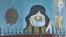 Mural bertema protokol kesehatan Covid-19 menghiasi tiang pancang jalan tol di Jalan Ahmad Yani, Jakarta, Minggu (13/12/2020). Warna-warni mural ini dibuat oleh seniman dari berbagai daerah. (merdeka.com/Iqbal S. Nugroho)