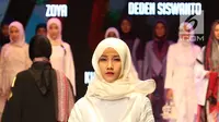 Model berjalan mengenakan busana muslim saat pembukaan Muffest 2018, Jakarta, Kamis (19/4). Selain fashion show, Muffest menyajikan pameran 200 merek fashion muslim yang berlangsung mulai 19 April hingga 22 April 2018. (Liputan6.com/Immanuel Antonius)