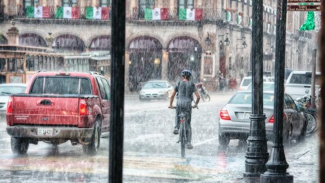 Ilustrasi kehujanan, bersepeda dalam hujan