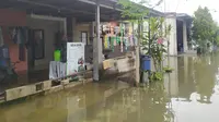 Suasana banjir di Gresik. (Dian Kurniawan/Liputan6.com)