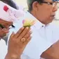 I Gusti AGung Prana mengajak para ilmuan menguji coba penanaman terumbu karang dengan metode biorock. (Liputan 6 SCTV)