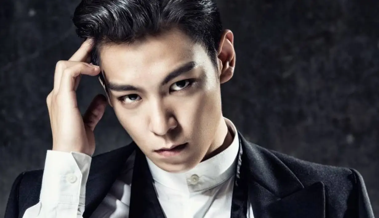 T.O.P BigBang menderita depresi pada tahun 2008. Para penggemar berspekulasi jika T.O.P kelelahan bekerja. (Foto: allkpop.com)