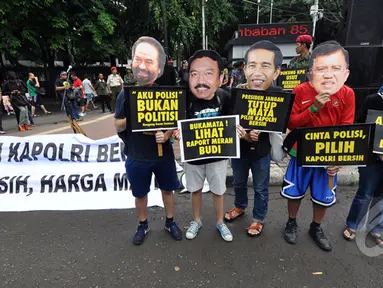 Massa dari Koalisi Untuk Reformasi Polri melakukan aksi simpatik "Pilih Kapolri Bersih" saat Car Free Day, Jakarta, Minggu (18/1/ 2015). (Liputan6.com/Miftahul Hayat)
